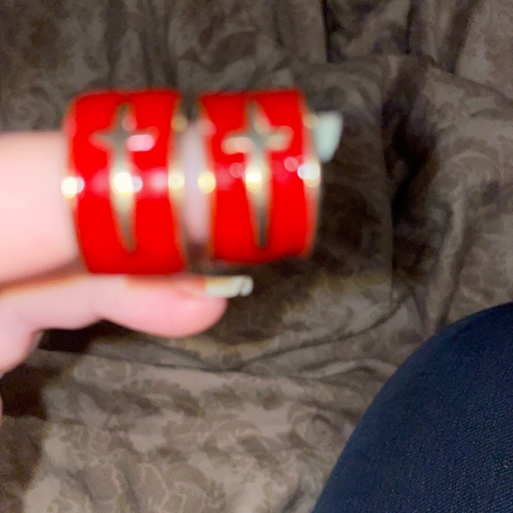These cross earrings are red with gold plates